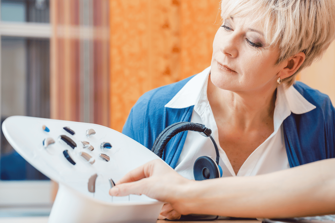 woman choosing the right hearing aid 