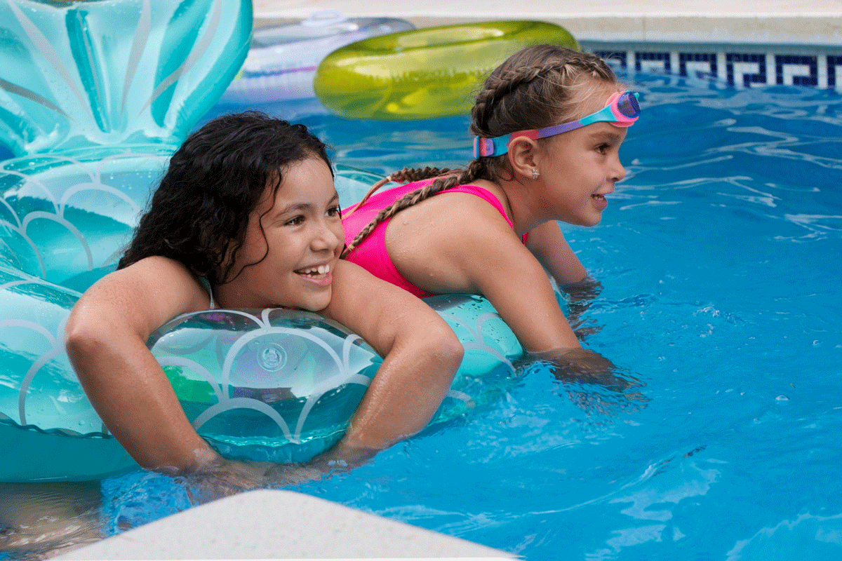Girls swimming in pool