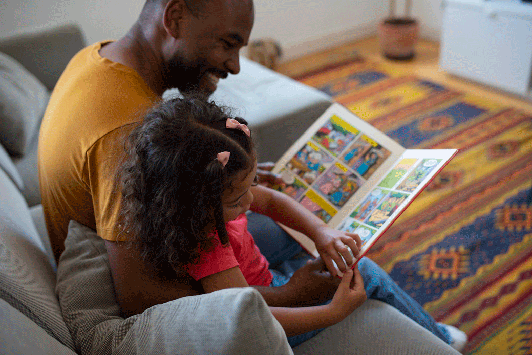 Dad reading to daughter Dementia and Hearing loss